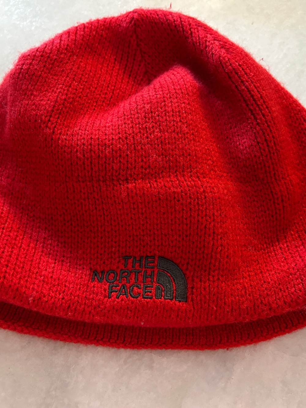 The North Face Red Knit Beanie with Black Logo